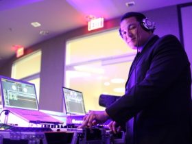 The Soundtrack of Success: Benefits of Hiring a Corporate DJ